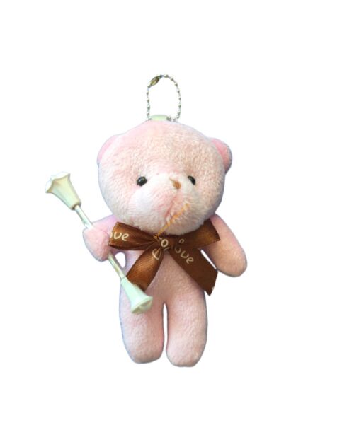 Pluszowy miś różowy z pałeczką